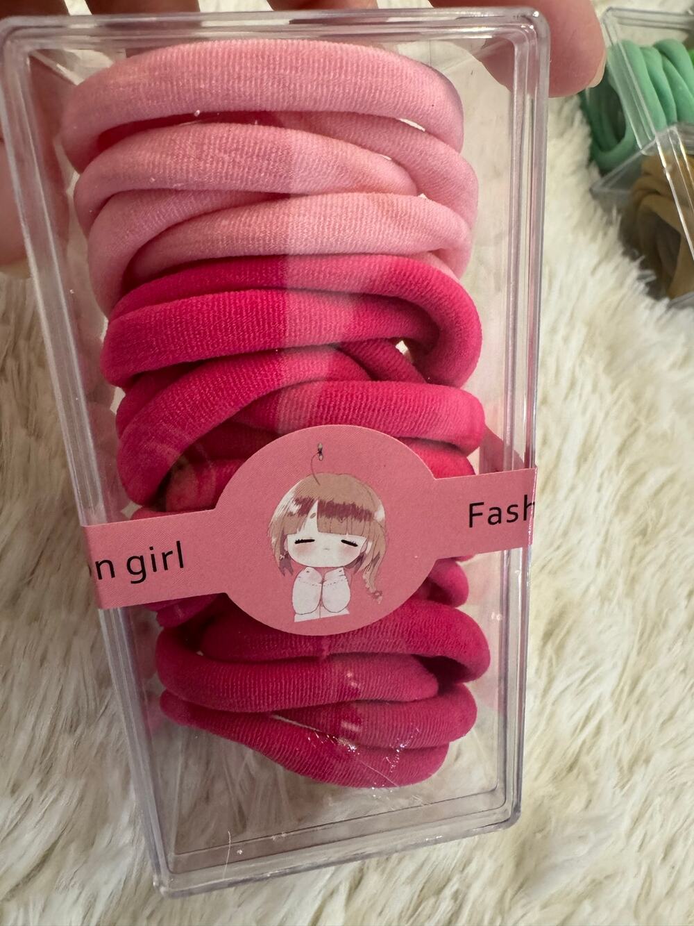 Pink ombre hair ties set in a clear box ready for school or any use